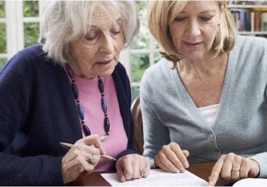 Who-can-witness-a-will-1 Woman witnessing a will